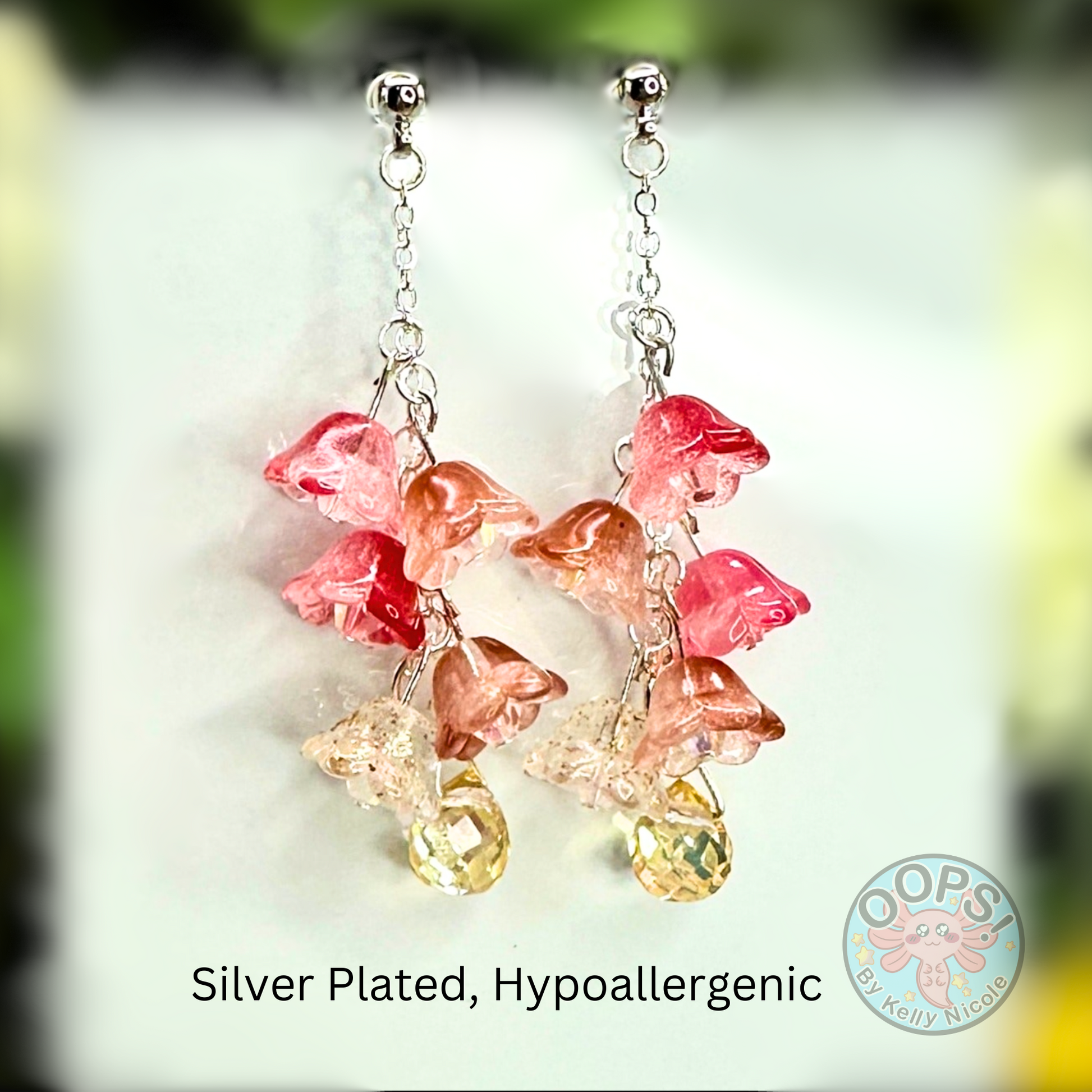 Wisteria Red  Blush  Floral Drop Earrings with Crystal dangle. Silver-Plated.  Lightweight, Hypoallergenic Statement posts. Its  seamlessly transitions from casual outings, Weddings and elegant events. 003 Shop online today to get yours at HTTPS://OOPSBYKELLYNICOLE.COM 